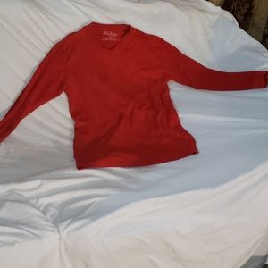 Worn red long sleeve tee